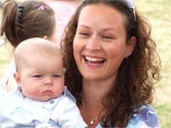 Donna Price, Greencastle, enjoys the sunshine with her baby Aaron at Redcastle Sports Day.