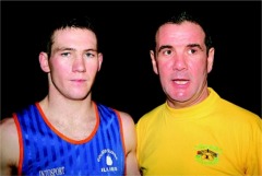Boxer William McLaughlin pictured with his coach Stephen Friel.