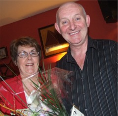 Owen Doyle thanks Margaret Kealey with a bunch of flowers.