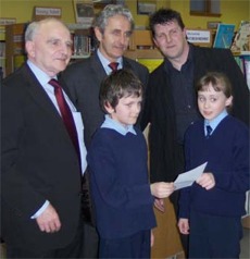 Patrick Kearney, back far right, pictured last year with Donegal County Manager Michael McLoone and Paddy Harte of the International Fund for Ireland with participants of Wordflight, the Flight of the Earls creative writing competition.