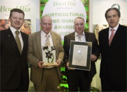 Pictured at the Bord Bia Food Awards at Dublin's City West Hotel are from left, Food Minister Trevor Sargent, Desmond and Kevin Harkin and Bord Bia chief executive, Aidan Cotter.