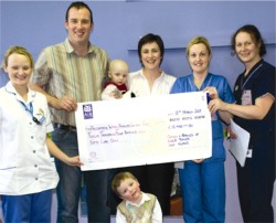 Pictured presenting a cheque for 12,450 to Letterkenny General Hospital Paediatric Ward are Kieran and Maura Toner with children Colm and Emer.