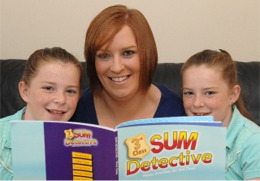 Pauline Dixon and her daughters Chantel and Rachel having 'sum' fun with maths.