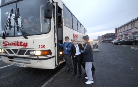 Derry pupils of Coliste Chinel Eoghain in Buncrana board a Swilly bus in Bridgend.