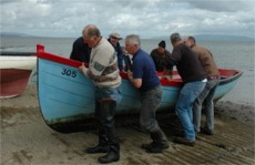 Foyle fishermen taking their boats from the water as the ban on drift netting came into force. Photo courtesy BBC.