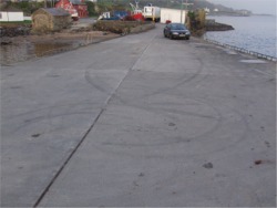 Tyre tracks left on Moville pier after driving stunts.