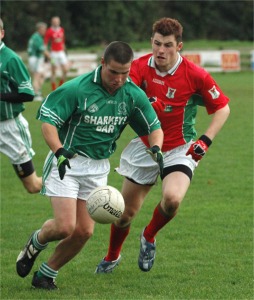 Naomh Mhuire and Carn battle it out.