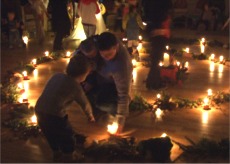 Planting a candle in the Advent Garden, Moville.