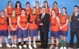 Pictured after their recent win are Carndonagh Community School senior girls basketball team. At front, from left, Karen Cooke, Eibhlin O' Kane, Kate Roddy, Danielle Doherty,  Paul Fiorentini, principal, Caroline Kelly, Danielle Gordon and coach Finbarr Gallagher. Back row from left are Caitlin Moyne, Darine Stevens, Angeline O'Kane, Deirdre O'Donnell, Deirdre Foley and Laura D'Urso.