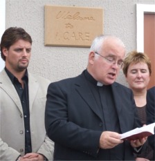 Buncrana parish priest, Fr. John Walsh reads a blessing for the new centre.