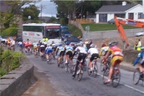 Cyclists competing in The FBD Milk Ras pass through Moville.