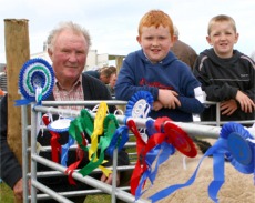 Danny McGonigle, Isle of Doagh, nephew Stephen and pal Tyler McBride pictured with Danny's award-winning sheep.