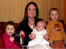 Sarah Quigley-Burns pictured with her children Loda, Saorla and Cillian.