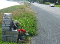A memorial marks the spot of the 2005 crash.