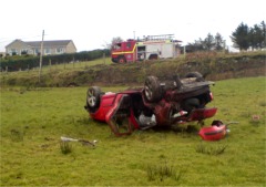The car that left the Mountain Road on Saturday and plunged 60m down into a field.