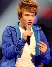 Eoghan Quigg performs during the X-Factor show on ITV.