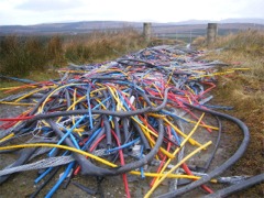 A mound of dumped cables closes a road at Carnamoyle, Muff.