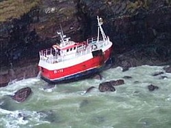 The 50ft crabbing boat Horizon stuck on rocks in Lough Swilly.