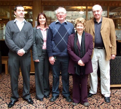 Jim Henderson, centre, with wife Sally and from left, Buncrana Town Clerk Seamus Canning, Samantha Nolan, incoming revenue collector, and retired Town Clerk Paul Doyle.