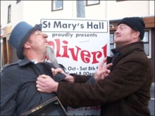 Gerard O'Neill as Fagin and Phil Ruddock as Bill Sykes square up to each other in 'Oliver, the Musical' to be staged soon in Buncrana.