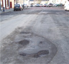 Potholes on Main Street in Moville.