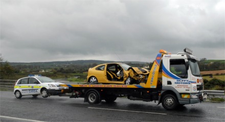 The two cars involved in the crash at Figary, Fahan, in the early hours of Sunday are towed away from the scene.
