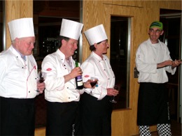 Head chef Paul McDaid, far right, announces the first Masterchef finalist as Ann McNicholl.  Also included are contestants Des Kelly, left, and Paul Fagan.