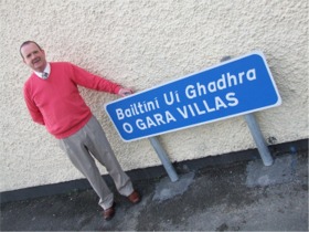Martin Farren at the new sign for O Gara Villas in Moville.