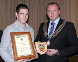 Mayor Lee Tedstone presenting the plaque and shield to William McLaughlin at the civic reception in Buncrana.