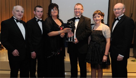 Denis Sheridan, centre, of DS Environmental Services, winner of the 2009 Donegal Business of the Year Award, at the Enterprising Donegal Business Awards, with wife Denise and children Conor and Lauren. Also pictured are Michael McLoone, left, chairman, Donegal County Enterprise Board and Michael Tunney, right, CEO, Donegal County Enterprise Board. Photo: Paul MacGinty.