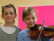Aoibheann, 10 and Marie Claire, 11, enjoy the Encore music workshops.